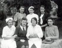Bronislava Fabrikant with her patients and nurses in the health center