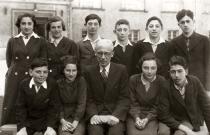 Rocha Naimark with her teacher and classmates from the Jewish lyceum