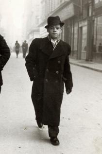 Hana Gasic's father Menahem Montiljo walking down the street in Sarajevo