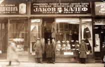 Jakov Kalef in front of his store